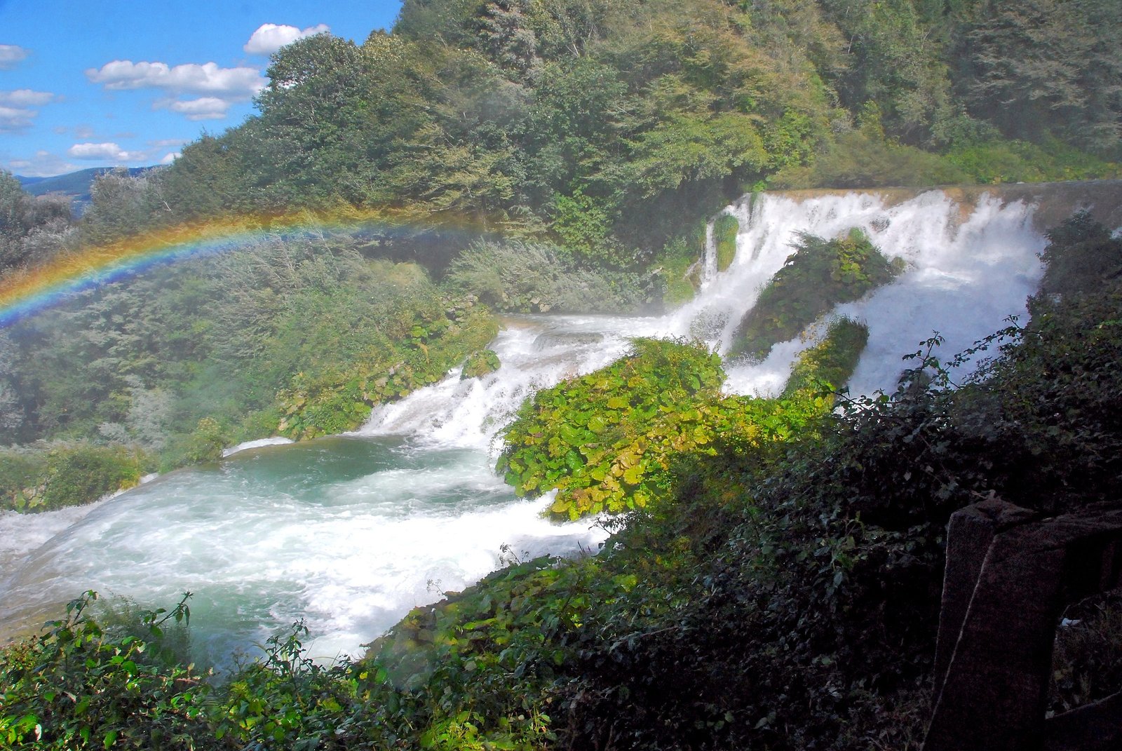 A rainbow arcing across the lower section of the Marmore Falls