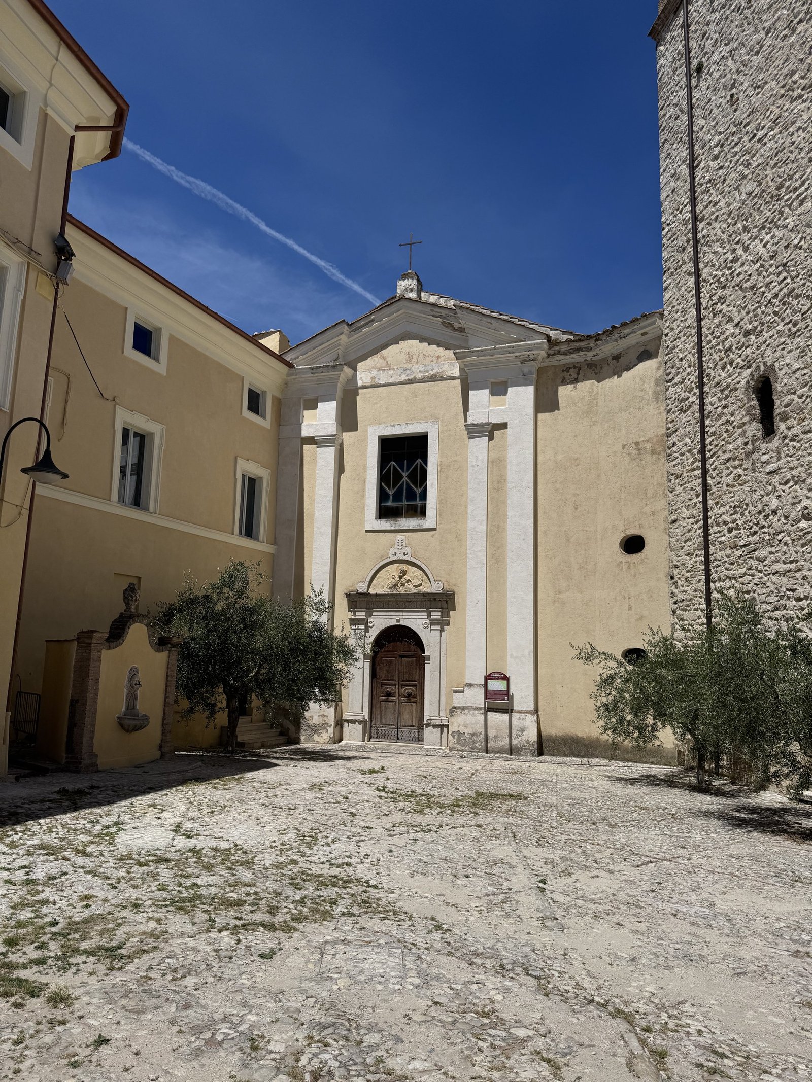 The church of San Pietro at Collestatte, its carved stone portal inscribed PRINCIPI APOSTOLOR