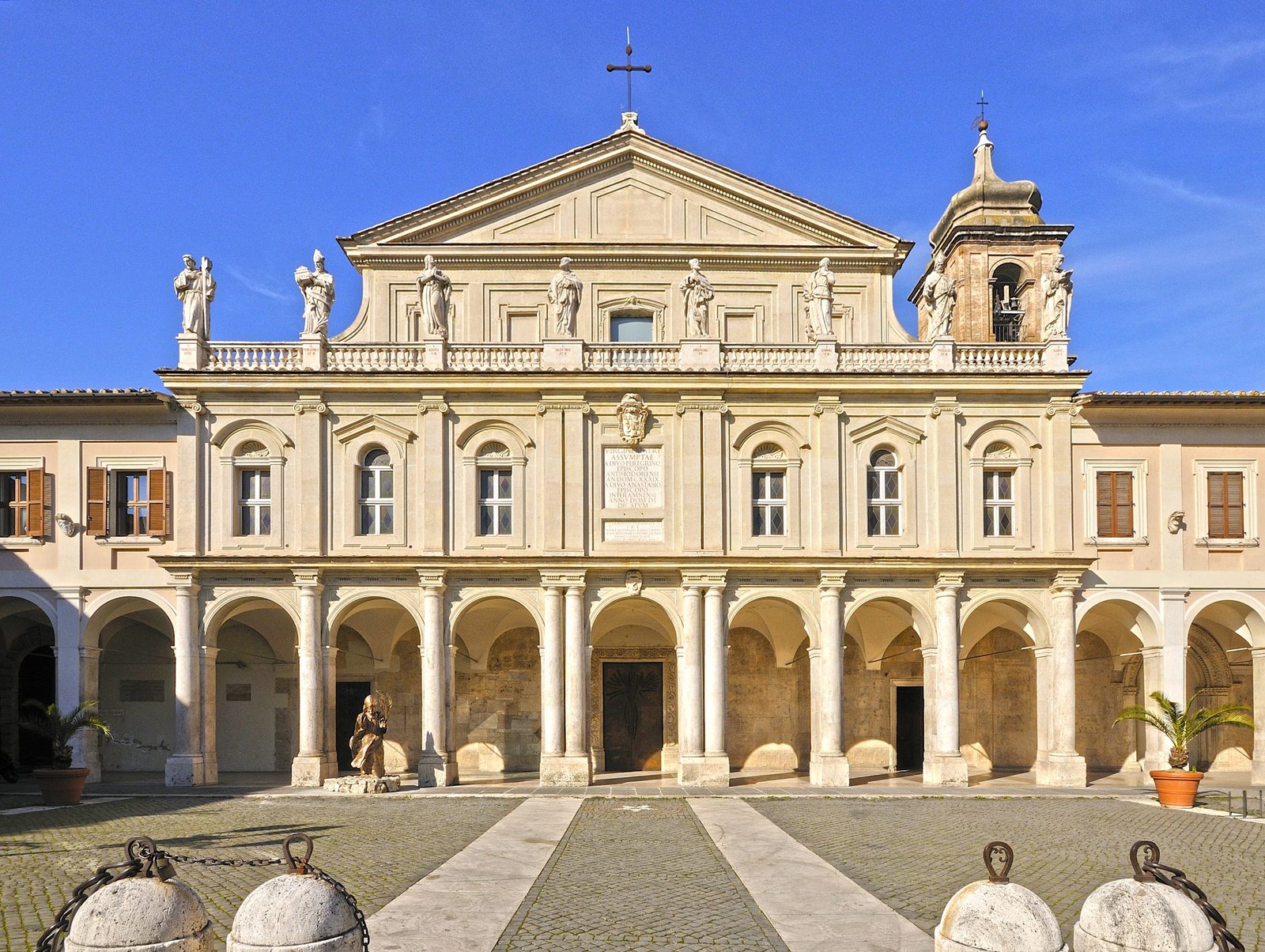 The cathedral of Santa Maria Assunta in Terni, its long portico and twin bell towers seen across the piazza
